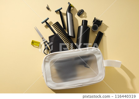 Men's shaving tools in cosmetic bag on beige background, top view Men's shaving tools in cosmetic bag on beige background, top view 116440319