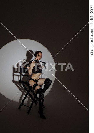 Studio fashion shot of the pretty young woman.  116440575
