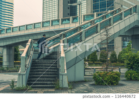 Middle-aged office worker doing outside sales Middle-aged office worker doing outside sales 116440672