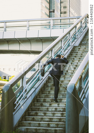 Middle-aged office worker doing outside sales Middle-aged office worker doing outside sales 116440982