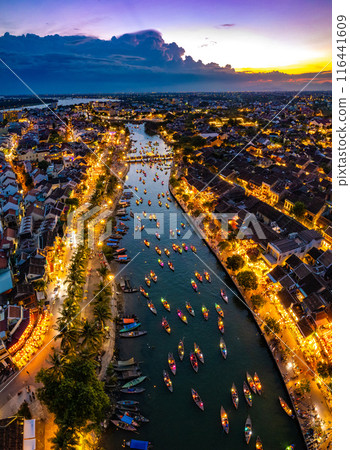 Aerial view of Hoi An Ancient Town with lantern boats on Hoai river, in Hoi An, Vietnam Aerial view of Hoi An Ancient Town with lantern boats on Hoai river, in Hoi An, Vietnam 116441609