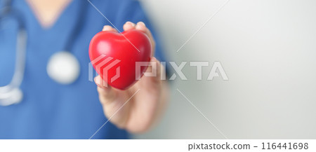Doctor hand holding red heart shape in hospital. love, donor, world heart day, world health day, CSR donation and Insurance concepts 116441698
