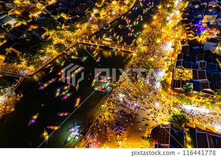 Aerial view of Hoi An Ancient Town with lantern boats on Hoai river, in Hoi An, Vietnam 116441778