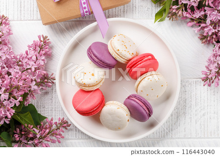 Colorful macaroons, arranged in a delightful display of vibrant hues Colorful macaroons, arranged in a delightful display of vibrant hues 116443040