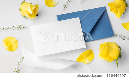 Card and blue envelope with yellow roses and white ribbon, father's day card 116444397