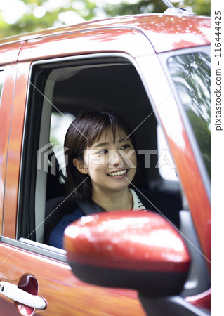 Women driving 116444425