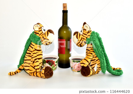 Friendly conversation between two comrades over a bottle of wine. Friendly conversation between two comrades over a bottle of wine. 116444620