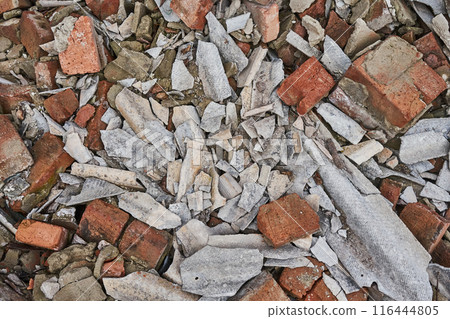 Pile of broken bricks and slate. Rubbish on a construction site Pile of broken bricks and slate. Rubbish on a construction site 116444805