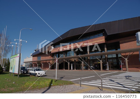 Brick tile architecture with large sloped roof. Tokachi Obihiro Airport, a designated regional airport with free parking. 116450773