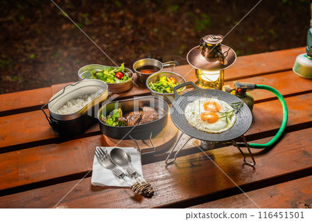Hamburger steaks charcoal outdoors at camp Hamburger steaks charcoal outdoors at camp 116451501