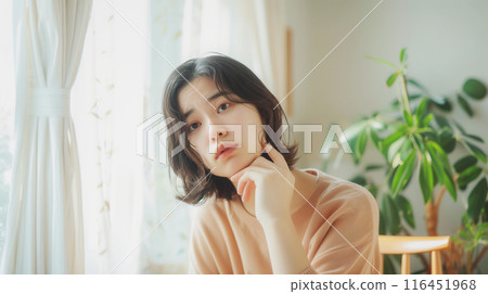 A young woman who thinks 116451968