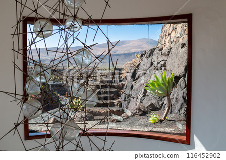 Window and a panorama, Cactus Park, Spain 116452902