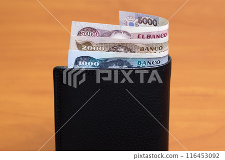 Colombian Pesos in the black wallet 116453092
