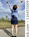 A female police officer rejoices 116455009