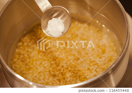 Seasoning the cooked rice Seasoning the cooked rice 116455448