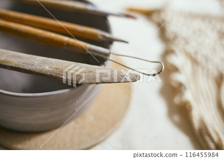 Close up Tools for forming clay on background 116455984