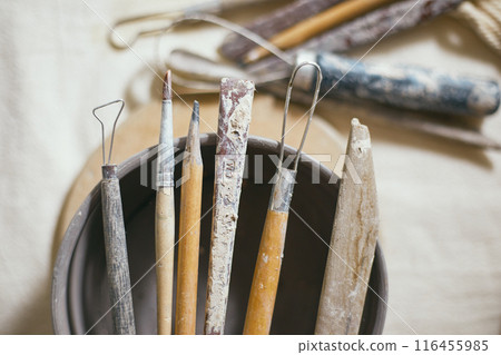 Close up Tools for forming clay on background 116455985