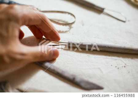 Close up Tools for forming clay on background Close up Tools for forming clay on background 116455988