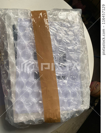Safe and secure package delivery with bubble wrap Safe and secure package delivery with bubble wrap 116457129