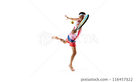 Sportive and competitive young man, tennis layer in motion with colorful paddle racket, playing isolated on white background Sportive and competitive young man, tennis layer in motion with colorful paddle racket, playing isolated on white background 116457822