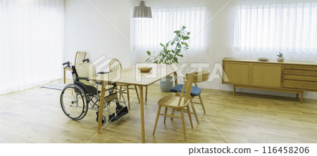 A wheelchair placed in a living room with bright windows Banner size A wheelchair placed in a living room with bright windows Banner size 116458206