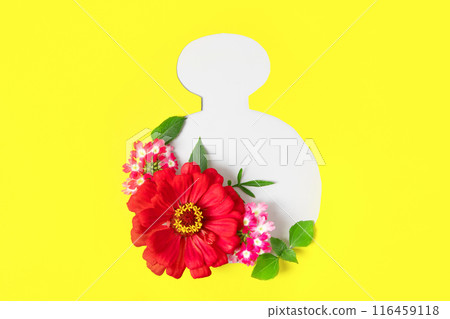 Mockup cut-out bottle of cosmetics made of yellow paper with flowers and leaves. Design for new product, banner, promotion sale, cosmetic, presentation, your text and sentences 116459118