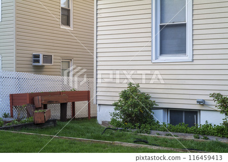 A home backyard with a yard A home backyard with a yard 116459413
