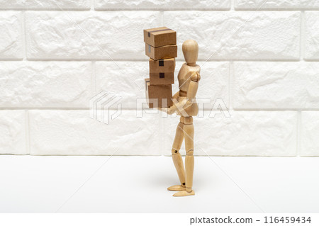 A person carrying a package in a cardboard box A person carrying a package in a cardboard box 116459434