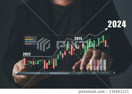 man touch graphs and progress of business and analyze financial,and investment.online business,e-commerce,online marketing.Use technology to plan strategy to success goals and growth stock 2024. 116461221