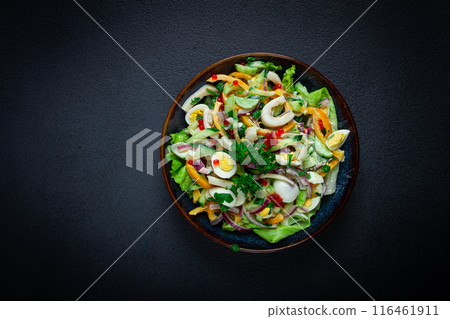 salad with squid, fresh cucumber, eggs, sweet pepper, red onion, with dressing, homemade, no people, 116461911