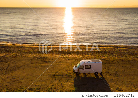 Caravan van on beach. Aerial view Caravan van on beach. Aerial view 116462712