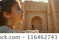 Beautiful woman in traditional Egyptian clothing in an ancient Egyptian temple. 116462743