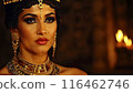 Beautiful woman in traditional Egyptian clothing in an ancient Egyptian temple. 116462746