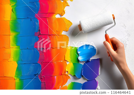 Hand Painting Vibrant Colors on White Wall 116464641