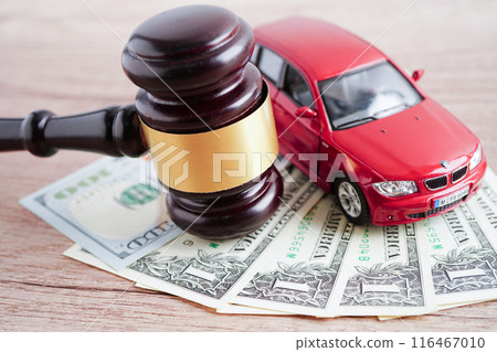 Bangkok, Thailand March 15, 2024 Car accident lawsuit and insurance, Judge hammer and money with car model. 116467010