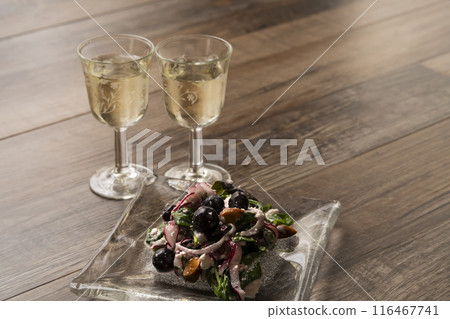 Blueberry and cottage cheese salad with wine, natural light Blueberry and cottage cheese salad with wine, natural light 116467741