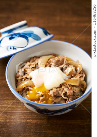 Beef bowl topped with a soft-boiled egg 116468250