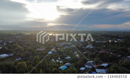 Aerial view of rice field and village in the countryside 116468558