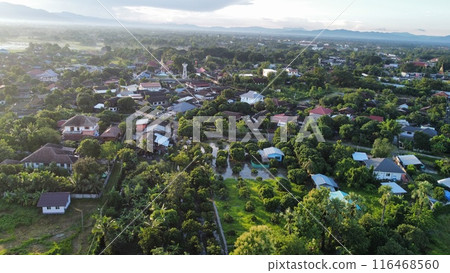 Aerial view of rice field and village in the countryside Aerial view of rice field and village in the countryside 116468560