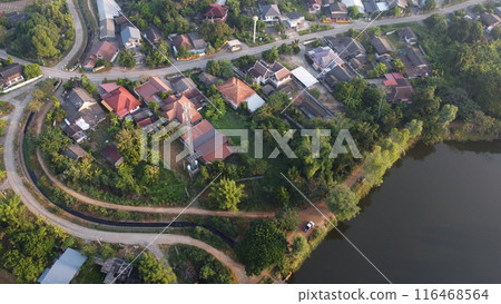 Aerial view of rice field and village in the countryside 116468564