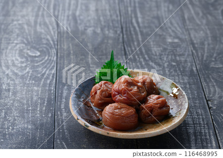 Kishu Nanko Plums Pickled in Honey (Honey Umeboshi) Black Background Kishu Nanko Plums Pickled in Honey (Honey Umeboshi) Black Background 116468995