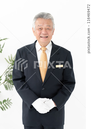 Senior man, business, white gloves, vertical 116469472