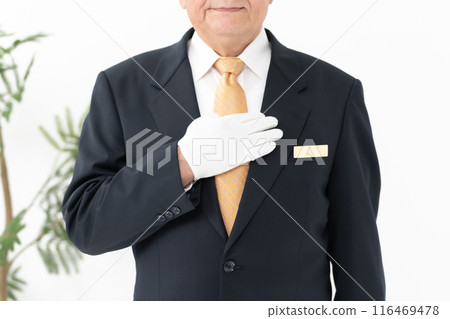 Senior male business white gloves faceless 116469478