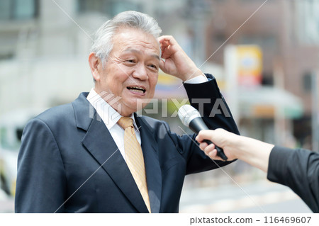 Senior male street interview 116469607