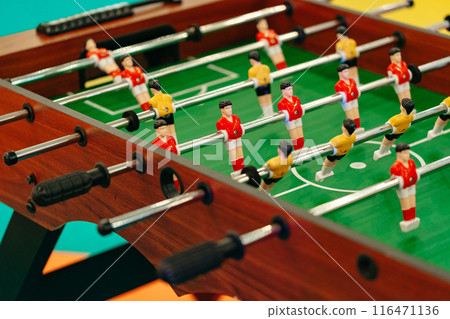 Close Up of a Foosball Table With Foosball Players 116471136