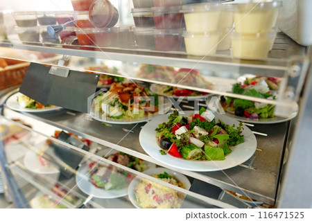 Freshly Prepared Salads on Display in a Cafeteria During Lunchtime Freshly Prepared Salads on Display in a Cafeteria During Lunchtime 116471525