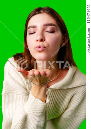 Woman in White Sweater Making Hand Gesture Woman in White Sweater Making Hand Gesture 116471691