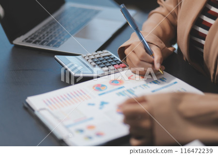 Business people team working at office with tablet and document, doing planning analyzing the financial report, business plan investment, finance analysis concept. Economic business discussions. 116472239