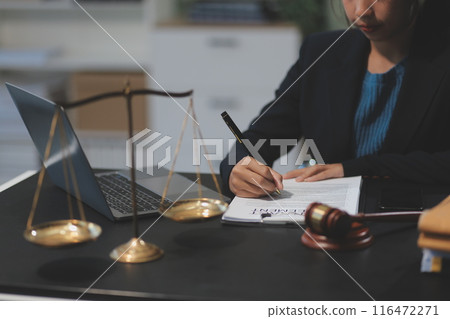 female business woman lawyers working at the law firms. Judge gavel with scales of justice. Legal law, lawyer, documents, advice and justice concept. 116472271
