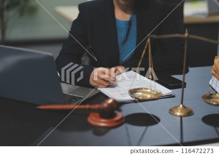 female business woman lawyers working at the law firms. Judge gavel with scales of justice. Legal law, lawyer, documents, advice and justice concept. 116472273